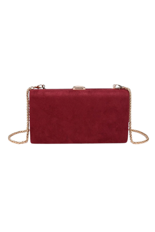 Urban Expressions Babe Clutch in Burgundy featuring a rich suede-effect exterior, sculptural hammered metal clasp, and removable chain strap.
