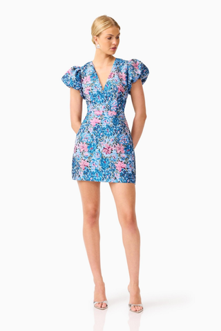 Elliatt Antheris Mini Dress in Blue Multi featuring a vibrant blue and pink floral print, romantic puff sleeves, fitted waist, and flattering mini silhouette.
