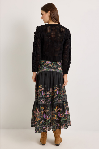 Marie Oliver Lindsay Sweater in Black featuring open-knit detailing, sculptural ruffles, and a classic crew neckline.