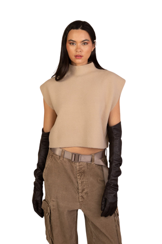 Kerisma Tetra Top in Beige featuring a sleeveless cropped silhouette, structured shoulders, and mock neckline.