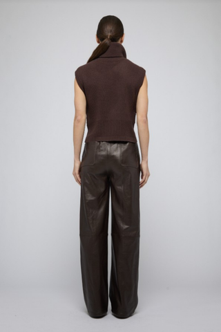 Chocolate brown sleeveless ribbed turtleneck knit top.
