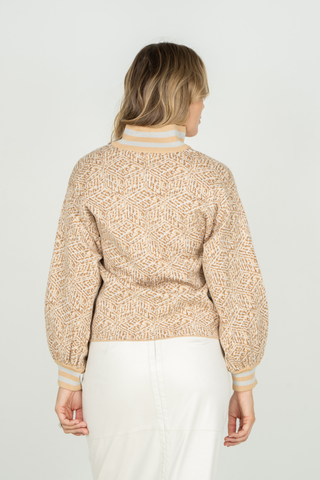 Emily McCarthy Lolli Sweater in Mosaic neutral knit featuring a V-neckline, textured finish, long balloon sleeves, and relaxed silhouette.