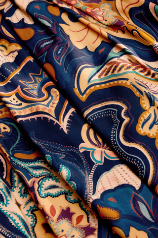 Marie Oliver Wren Top in Saddle featuring a bold Western-inspired print, gathered neckline, and short puff sleeves.