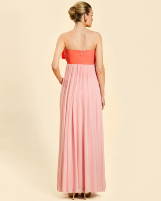 Mestiza Kiss Me Knot Gown in Bloom Pink featuring a strapless chiffon silhouette with an oversized statement bow and flowing skirt.