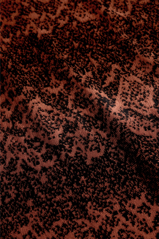 Shiloh Skirt in Oxide featuring a rust and black abstract print, fitted silhouette, and softly flared mermaid hem.