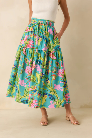 Colorful floral tiered midi skirt with self-tie waist detail in turquoise, pink, and green print by Prosperina