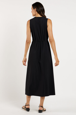 Jude Connally Bebe Dress in Black featuring a sleeveless silhouette, V-neckline, adjustable drawcord waist, and flowing midi-to-maxi length.