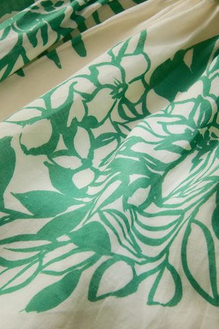Close-up of green leaf pattern on fabric