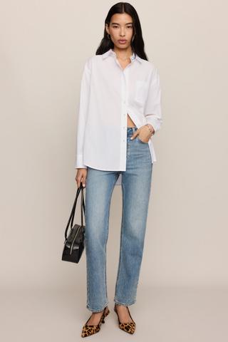 Z Supply The Gallery Button Up in White featuring crisp cotton poplin, a classic collar, button-front closure, long sleeves, and relaxed silhouette.