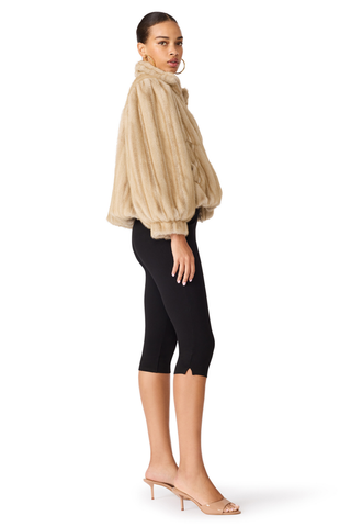 Deedee Jacket in Heather Almond featuring plush faux fur, a stand collar, voluminous sleeves, and a cropped silhouette.