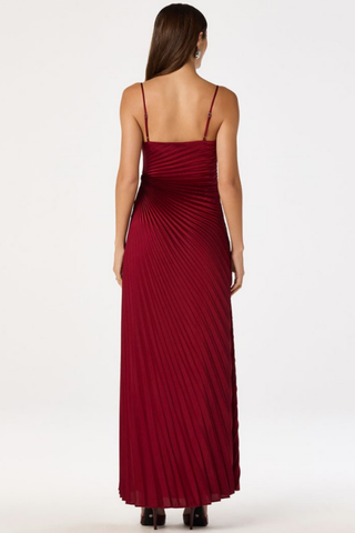 ASTR Paulette Dress in Wine featuring spaghetti straps, draped neckline, pleated floor-length silhouette, and thigh-high side slit.