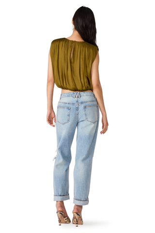 Steve Madden Milana Top in Fir Green, a sleeveless olive green blouse with gathered detailing and a relaxed silhouette.