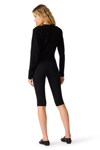 Steve Madden Maxwell Cardigan in Black featuring a fitted silhouette, crew neckline, button front, and long sleeves.