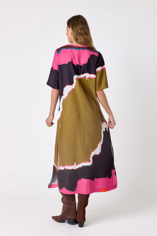 Crosby Grayson Dress in Portoro featuring an olive, pink, black, and cream abstract print in a relaxed maxi silhouette.