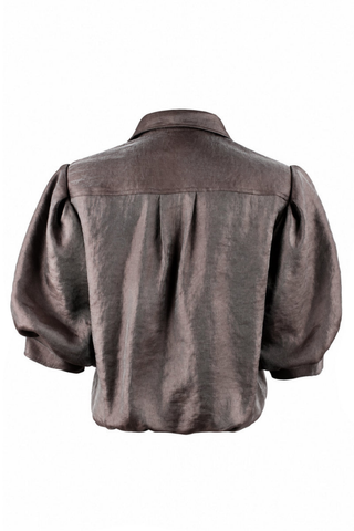 Finley Bomba Metallic Shirt in Brown featuring shimmering iridescent fabric, a spread collar, button-front closure, elbow-length blouson sleeves, and a flattering twisted front hem.