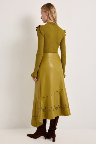 Marie Oliver Casey Skirt in Willow featuring vivid chartreuse vegan leather, laser-cut floral details, and an asymmetrical midi hem.
