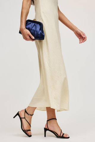 Urban Expressions Winter Clutch in Midnight blue with soft pleating, polished metal frame, kiss-lock clasp, and slender chain strap.