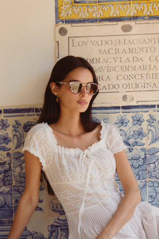 KREWE Barrett Sunglasses in Amalfi featuring rounded glossy acetate frames with amber gradient lenses and a multicolor marbled finish