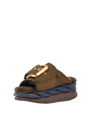 4CCCCEES Mellow Laze Sandal in Chocolate with sheep shearling lining, oversized metal buckle, and navy ripple-designed sole.