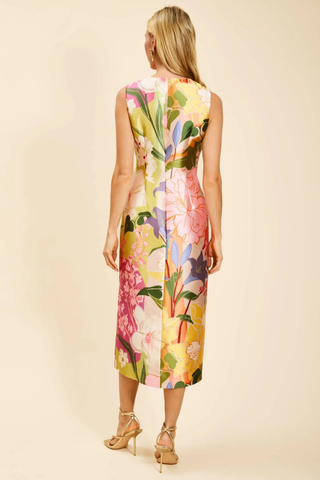 Mestiza Serena midi dress in colorful floral print with asymmetrical front and gold hardware detail