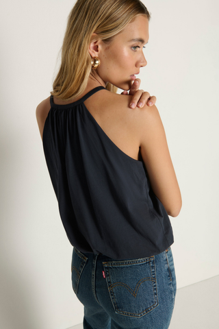 Model wearing the Nation LTD Bell Bubble Top in Night Sky featuring a gathered halter-inspired neckline, bubble hem, and relaxed Pima cotton silhouette.