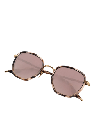 Krewe Peyton Sunglasses in Matte Black Fade featuring a rounded acetate frame, gold-tone metal details, and gradient lenses.