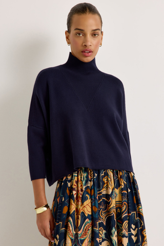 Marie Oliver Claudie Popover in Navy featuring a cropped boxy silhouette, mock neckline, and three-quarter batwing sleeves.