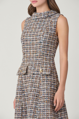 Shoshanna Charlotte Dress in Multi featuring shimmer tweed, a sleeveless mock neckline, A-line silhouette, and decorative pocket details.