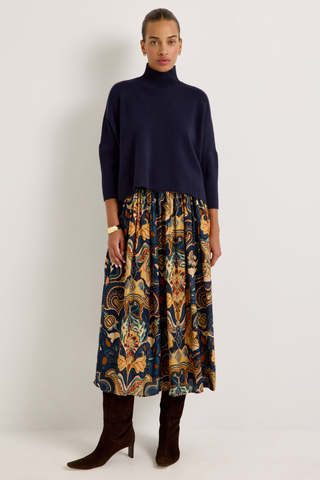 Marie Oliver Claudie Popover in Navy featuring a cropped boxy silhouette, mock neckline, and three-quarter batwing sleeves.