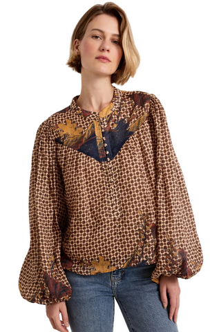 Marie Oliver Rhiannon Top in Flores featuring a brown mixed print, contrasting yoke, stand collar, button placket, and long gathered sleeves.