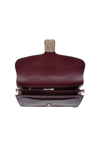 Urban Expressions Coco Crossbody in Wine featuring a structured vegan leather silhouette, flap front, buckle detail, and detachable strap.