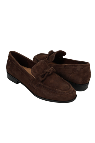 Brown suede Kaye Loafer with apron toe, knotted keeper strap, and low stacked heel.