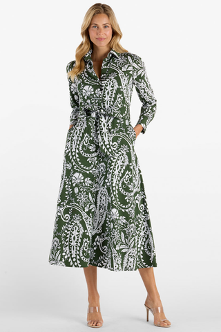 Jude Connally Kitty Dress in Wild Paisley Navy Loden featuring a green and cream paisley print, long sleeves, point collar, and belted midi silhouette.