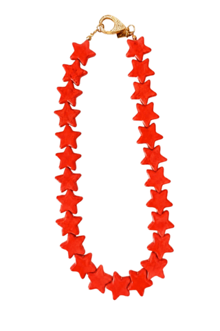 Smith & Co. Design Large Star Necklace in Bright Red featuring oversized fiery red star-shaped beads and a lobster clasp closure.
