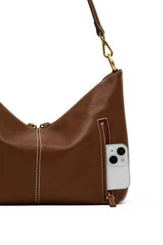 Hammitt Grace Med Handbag in Cinnamon Suede with antique gold hardware, brown leather trim, V-shaped top edge, and detachable straps.