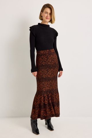 Shiloh Skirt in Oxide featuring a rust and black abstract print, fitted silhouette, and softly flared mermaid hem.