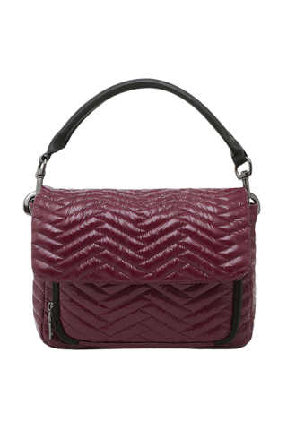 Think Royln Muse Moto Handbag in glossy deep burgundy with quilted chevron detailing and black trim.