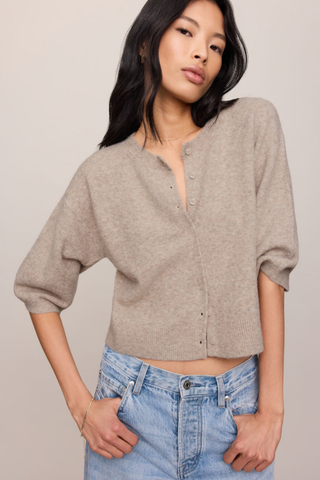 Natural heather button-front cardigan with elbow-length sleeves.