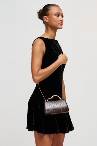 Rue Aveline Nichelle Clutch in Espresso featuring textured vegan leather, a structured frame silhouette, gold-tone top handle, and removable chain strap.