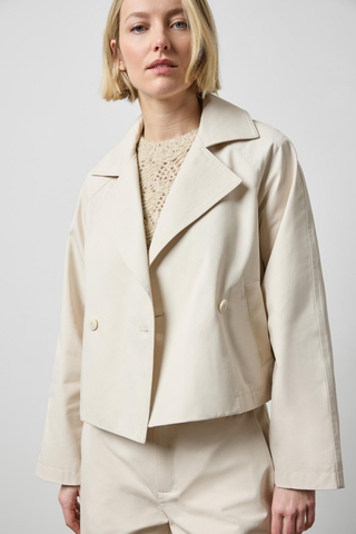 Lilla P Short Blazer in Porcelain featuring a cropped double-breasted silhouette, notch lapels, and structured cotton twill.