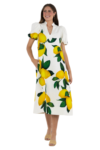 Emily McCarthy Hampton dress in limone with lemon print and midi silhouette