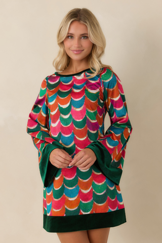 Prosperina Shannon Dress in Party Planner featuring a vibrant multicolor geometric print, long sleeves with dark green cuffs, and a relaxed mini shift silhouette.