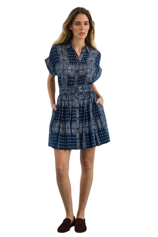 Hunter Bell Howard Dress in Inkwell Paisley featuring a blue paisley print, short sleeves, button-front bodice, and tiered mini skirt.