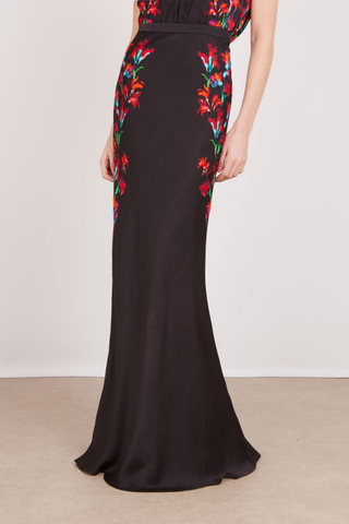 SALONI Gwen-C Dress in Equinox featuring a black base with red floral detailing, sleeveless high neckline, and floor-length flared skirt.