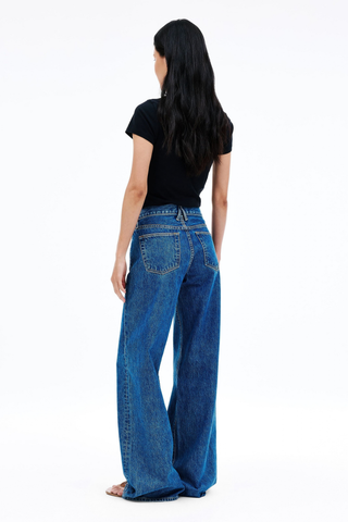 SLVRLAKE Mica Jeans in Sweet Memory featuring a relaxed low-rise fit, wide-leg silhouette, and timeless mid-indigo wash.