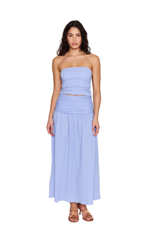 Light blue high-waisted maxi skirt with ruched waistband and flowing shape