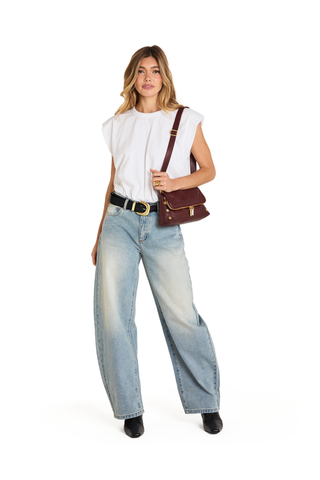 Hammitt Beverly Med Handbag in Cherrywood Pebble featuring deep oxblood leather, brushed gold hardware, and an elongated convertible silhouette.