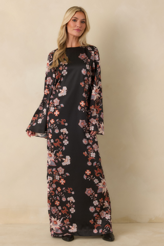 Prosperina Nix Maxi Dress in Nocturne featuring a long-sleeve black floral maxi silhouette with warm pink and rust-toned flowers.