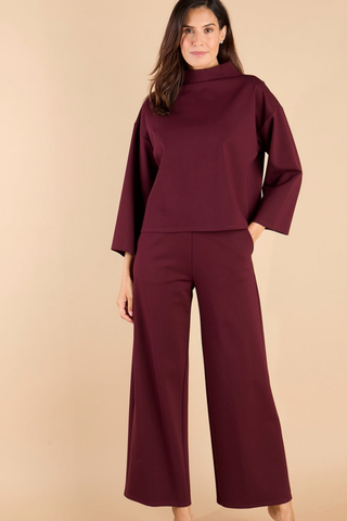 Jude Connally Marisa Top in Merlot featuring a relaxed silhouette, funnel neckline, and long sleeves.