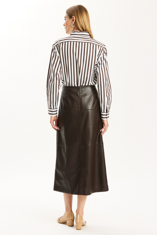 Brown punched vegan leather A-line midi skirt with front slit.
